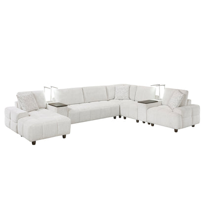 Tessella 7-Piece Modular Sectional with Left Chaise, Two Consoles with Hidden Storage, Wireless Speakers, Wireless Chargers, Swivel Table Top, Reading Lights and Charging Ports