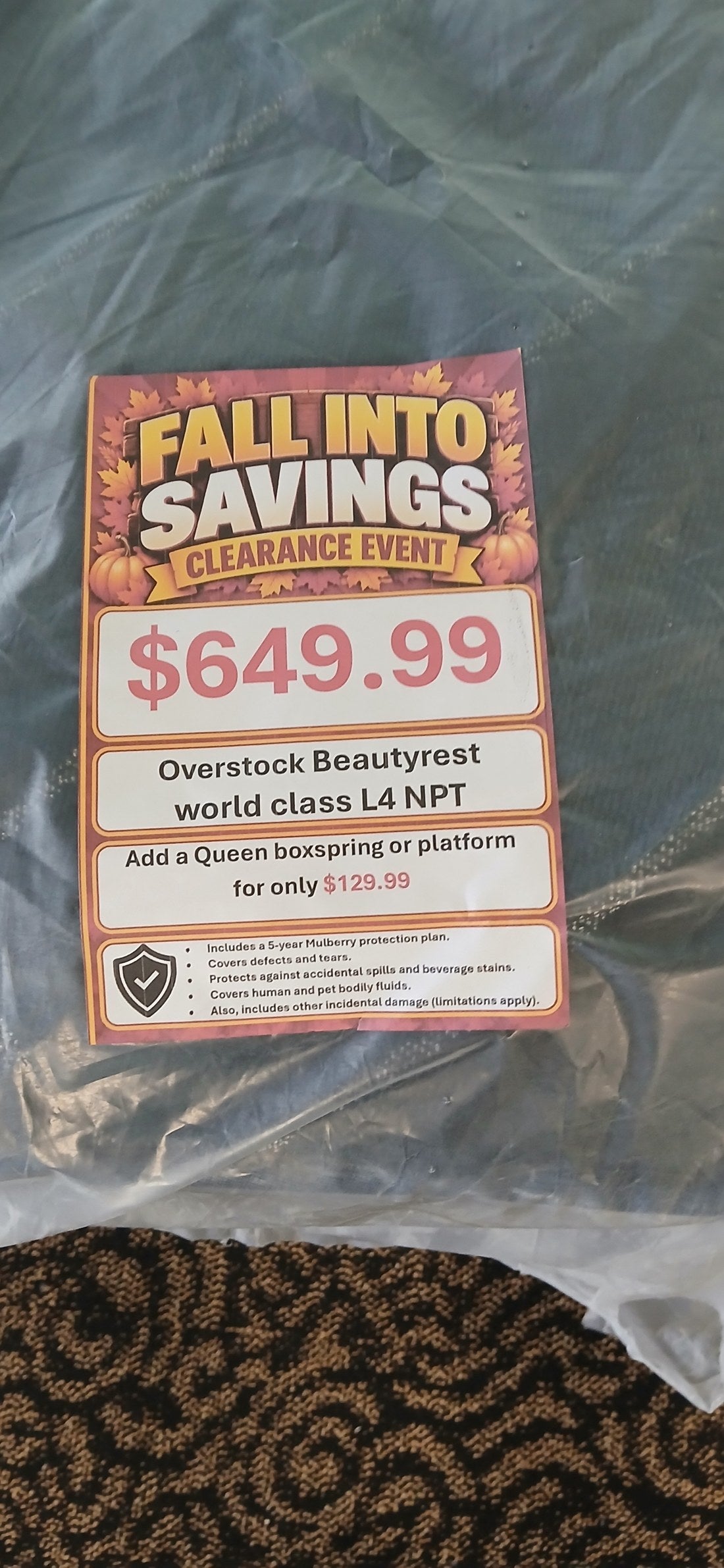 Overstock Beautyrest World Class L4 No Pillow Top Queen Mattress - price tag close-up